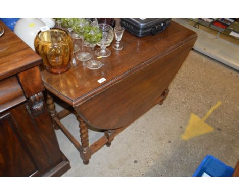 An oak gate leg barley twist table 