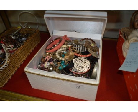 A Dior box and contents of various costume jewellery