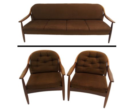 A 1970's Greaves and Thomas teak framed upholstered sofa bed 76cm high x 205cm wide x 82cm deep and two matching armchairs, 7