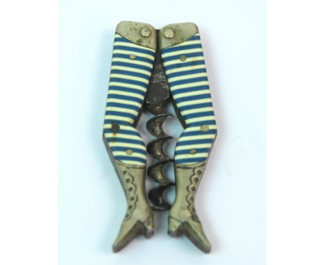 A German novelty folding pocket corkscrew in the form of a pair of ladies legs with blue striped celluloid stockings, stamped