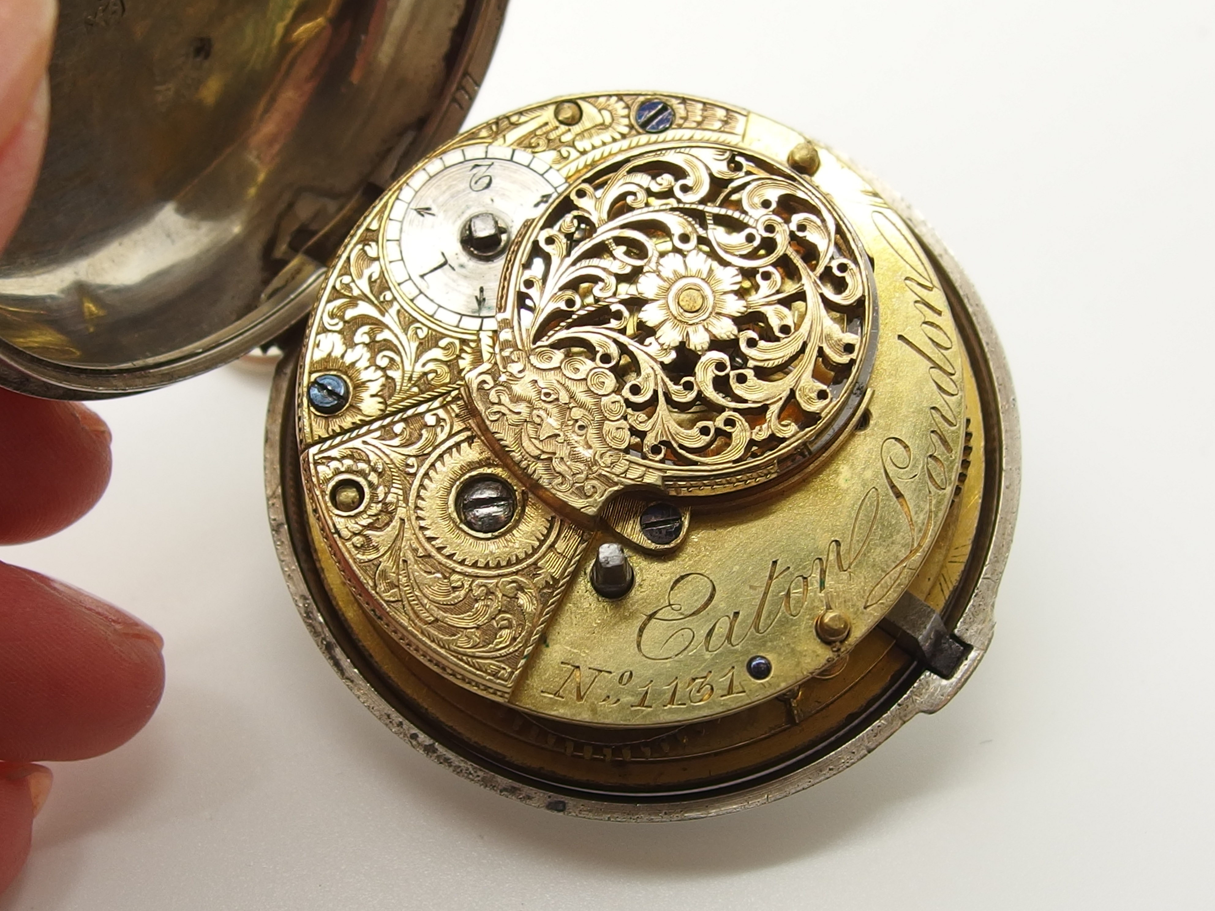 A IV silver pair cased pocket watch made by Eaton of London with