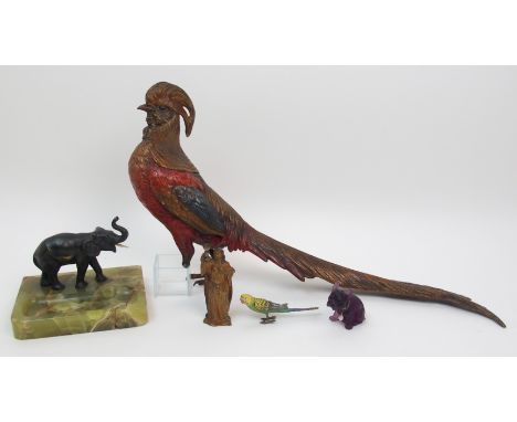 A Bergman cold painted bronze of an oriental pheasant a Bergman patinated bronze of a medieval woman holding aloft a chalice,