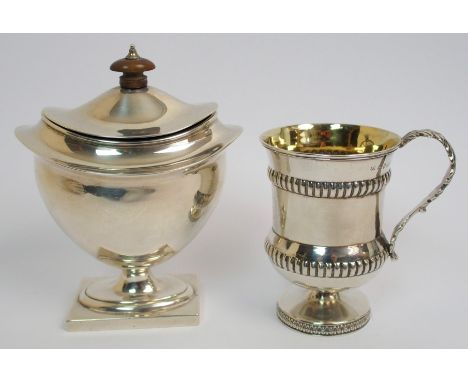 A silver tea caddy by Thomas Bradbury & Sons Limited, Sheffield 1910, the oval body tapering to a square pedestal foot, 15cm 