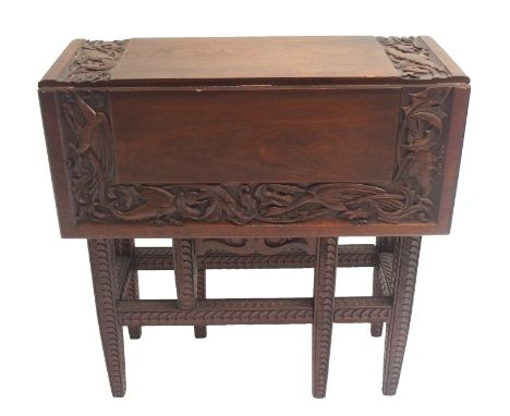 A late Victorian stained gateleg table the top carved with a band of dragons, on scale pattern square tapering legs, 73cm hig