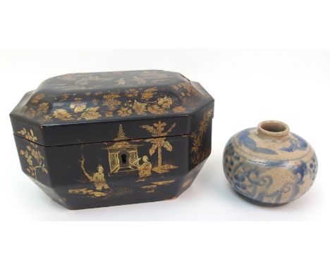 A Sarawak cobalt blue jar painted with fruit and scrolls, 7.5cm high and a black lacquered and gilt octagonal tea caddy decor