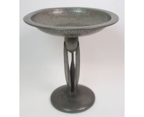 A Tudric pewter tazza designed by Archibald Knox for Liberty & Co, made by W.H. Haseler, no.01161, the circular domed foot su