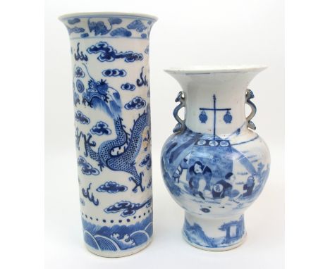 A Chinese blue and white baluster vase painted with figures camping beside a tent, ruji scroll handles, six character mark, 2