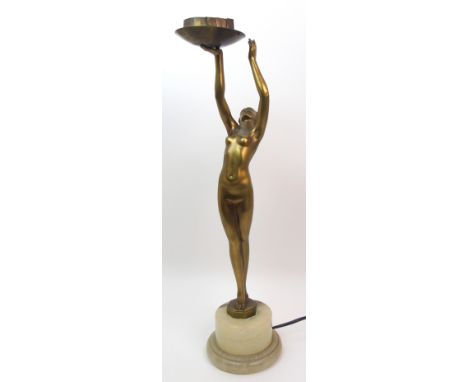 An Art Deco lady lamp modelled standing with her arms raised holding the light fitting 49.7cm high (disassembled)