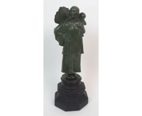 •Charles Leonard Hartwell R.A. (1873-1951) Mother and Child a cast and patinated bronze of a mother carrying her child on her