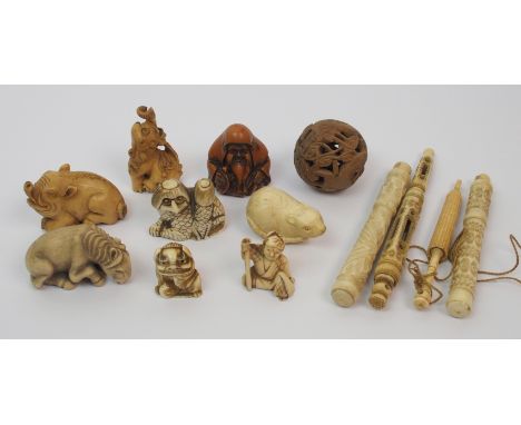Nine netsuke and other carvings comprising; a rat, 4.5cm wide, boar, signed, 5cm wide, pony, signed, 5cm wide, three grotesqu