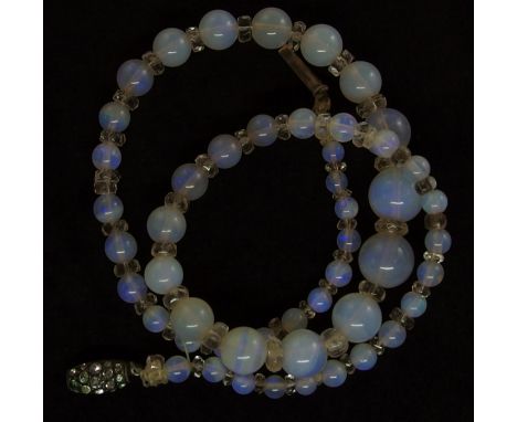 A string of opal beads interspaced with clear glass beads, largest opal bead approx 9.8mm smallest approx 3.8mm, length as st