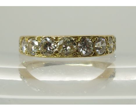 An 18ct gold nine stone diamond ring of estimated approx 1.70cts, one diamond (af). Finger size R, weight 5.4gms