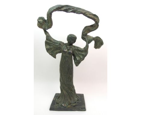 A green patinated bronze of a dancing woman upon rectangular base, unsigned, 46cm high