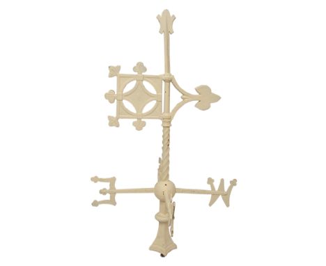 A cast iron weather vane with trefoil pointer above N, S, E and W tapering, 101cm high