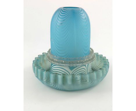 A Nailsea Verre Moire glass fairy lamp, combed opaque over blue, the crimped doughnut ring stand with Clarke's pressed holder