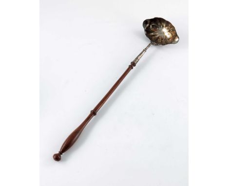 A silver toddy ladle or punch ladle, Garrard &amp; Co, London 1969, monogrammed, lobed oval bowl, 38cm long