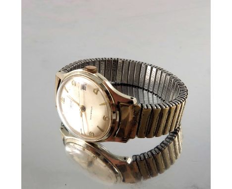 A Smiths gold plated automatic shockproof wristwatch, champagne dial with even Arabic numerals, date window and red arrow swe