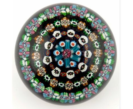 Paul Ysart, concentric millefiori paperweight with short radiating blue and light blue canes, unsigned, rough pontil, diamete
