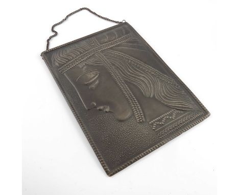 An Art Deco brass plaque, portrait of a young woman repousse decorated, Russian marks, 20cm x 15cm