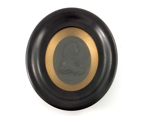 Wedgwood and Bentley, a black basalt relief moulded portrait plaque of Charles Pratt, Lord Camden, circa 1779, bust in profil