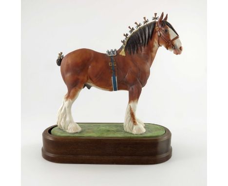 Doris Lindner for Royal Worcester, a porcelain model of a Clydesdale Stallion, 1976, raised on oval ceramic base surmounted b