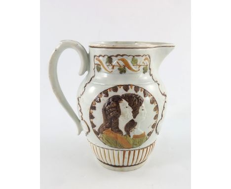 A George III relief moulded commemorative jug, painted in Pratt colours, portrait roundels of George III and William and Mary