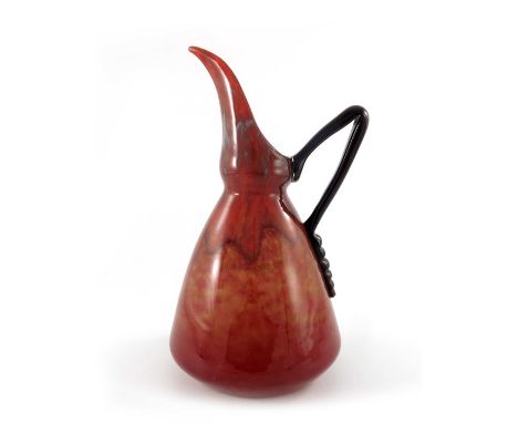 Charles Schneider, a Jade series glass pitcher, circa 1930, conical gourd form with whiplash handle, marbled and mottled, 34.