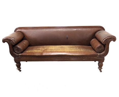 An early Victorian carved walnut sofa, Empire style, circa 1840, acanthus moulded horn scrolled arms on octagonal section bal