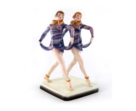 Stephan Dakon for Goldscheider, Dolly Sisters figure group, model 5612, circa 1926, in fur collared purple dresses, on a diam