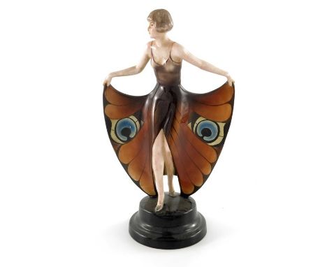 Josef Lorenzl for Goldscheider, a figure of a woman in butterfly wing dress, 6022, circa 1928, incised and printed marks and 