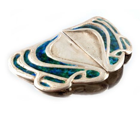 Archibald Knox for Liberty and Co., a Cymric Arts and Crafts silver and enamelled buckle, Birmingham 1905, winged form, with 