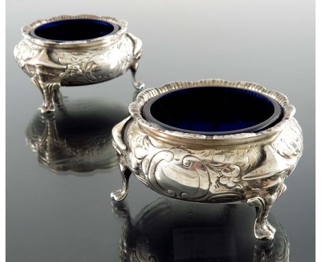 A pair of early Victorian silver salt cellars, John Wellby, London 1841, ovoid cauldron form in the Chinoiserie style, each w