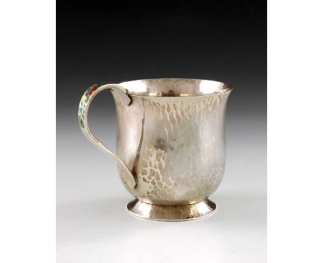 Bernard Instone, an Arts and Crafts silver and enamelled mug, Birmingham 1928, planished footed form, flared, the handle with