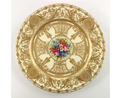 Harry Chair for Royal Worcester, a floral painted cabinet plate, the central bouquet within a raised gilt foliate scroll grou