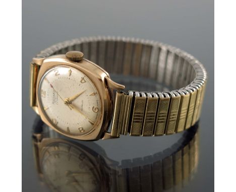 A 9 carat gold Rotary gents' wristwatch, cushioned square case with circular dial and red arrow seconds hand, manual wind, 3c