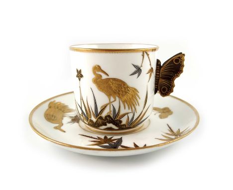 James Hadley for Royal Worcester, an Aesthetic Movement Japanesque cup and saucer, 1876, relief moulded butterfly handle and 