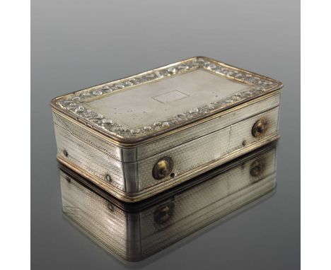 A George III silver gilt musical snuff box, London 1818, cuboid form, engine turned, the lid with a border of relief moulded 