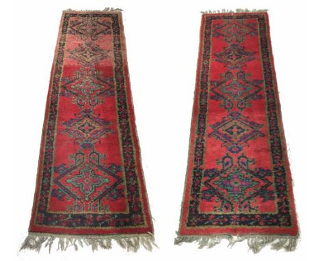 Pair of vintage runners, decorated with large foliate medallions within foliate border, 93" x 29" (2)