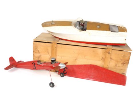 Fibreglass scale model pond motor boat, 31" long, (af) stand and crate; together with a partially complete scale model of a p