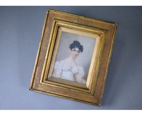 A Regency portrait miniature on ivory of a young lady in white dress, 12 x 9.5 cm, in original gilt frame (matches lots 1036 