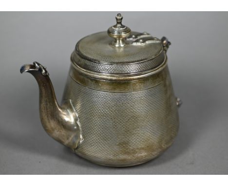 A Victorian silver bachelor teapot, decorated overall with engine turning, with rivetted strap hinges (insulators removed - h