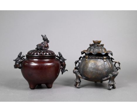 A Japanese tripod incense burner (koro) and pierced cover with guardian lion finial and handles, 19 cm high to/w another ince