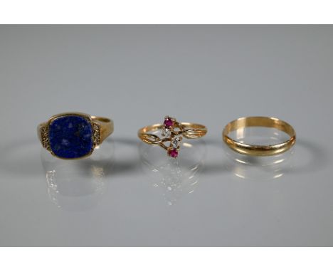 A 9ct yellow gold signet ring set with plain rectangular lapis lazuli plaque with diamond set shoulders, size U; a 9ct yellow