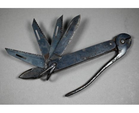 A scarce World War II 'escape evasion' folding knife, issued to the operators in the Special Operation Executive (SOE) and Of
