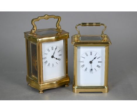 A lacquered brass French-style single drum carriage clock, with integral key-wind 8-day movement, the white enamelled dial wi