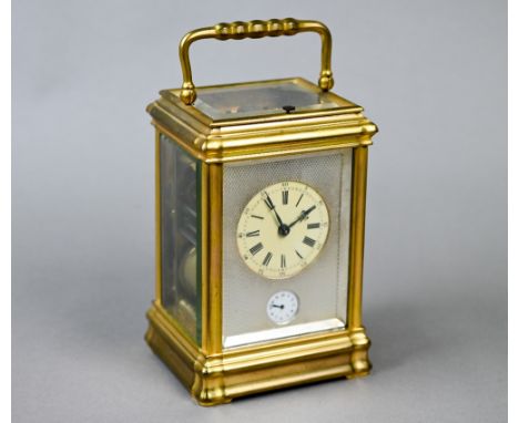 A 19th century French brass carriage alarm clock, the two train 8-day grande sonnerie and petite sonnerie repeat movement no 