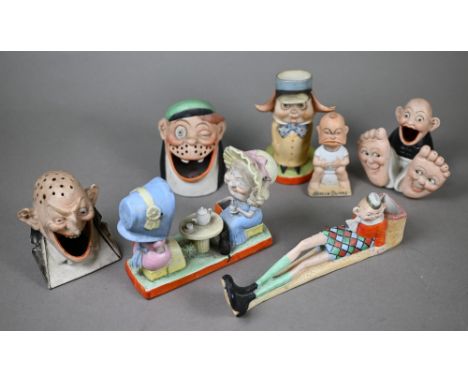 A Schafer &amp; Vater (Germany) novelty bisque match-pot - long legged baby, to/w a double match-pot - two old ladies having 