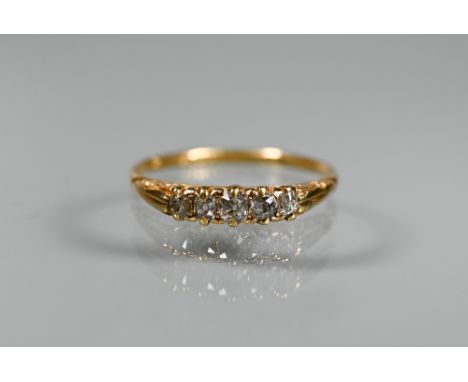 An antique five stone diamond ring, the old cut graduated diamonds in 18ct yellow gold shank, fully hallmarked, maker ME, app