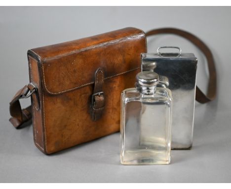 A leather-cased hunting picnic set, comprising a silver-topped flask,&nbsp;Charles Fox &amp; Co Ltd, London 1919 and an elect