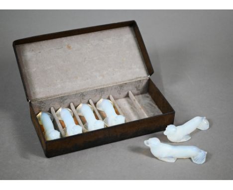 An Art Deco boxed set of six Danielo (Paris) opalescent glass 'seal' knife-rests, 9.5 cm long 